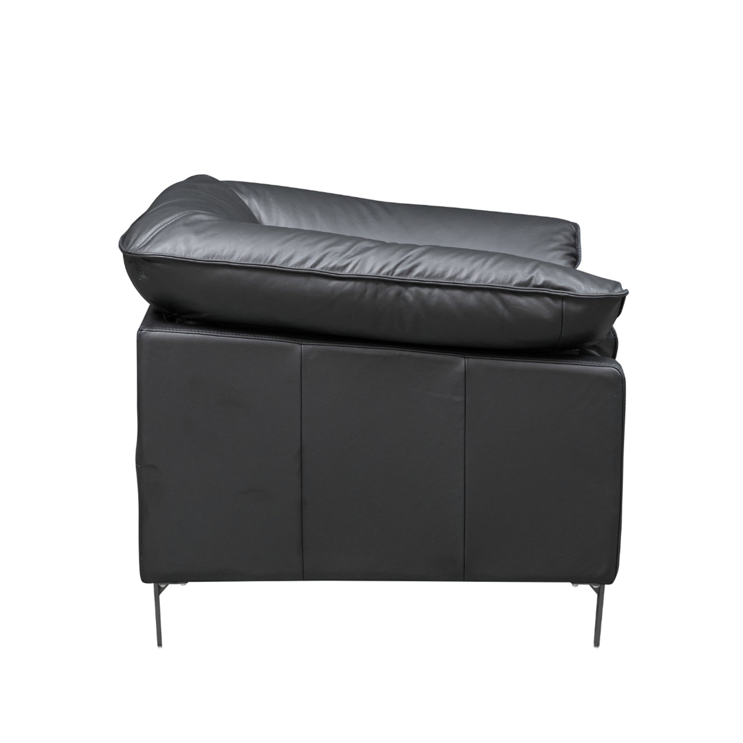 Side profile showing deep stitching detail and metal leg frame for Comfort Design Furniture