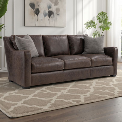 Ventura brown leather sofa three-quarter view in room setting for comfort designing furniture