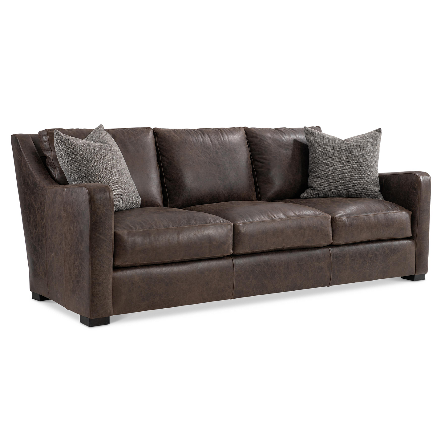 Ventura brown leather 3-seater sofa with curved modern design, front view with pillow for comfort design furniture