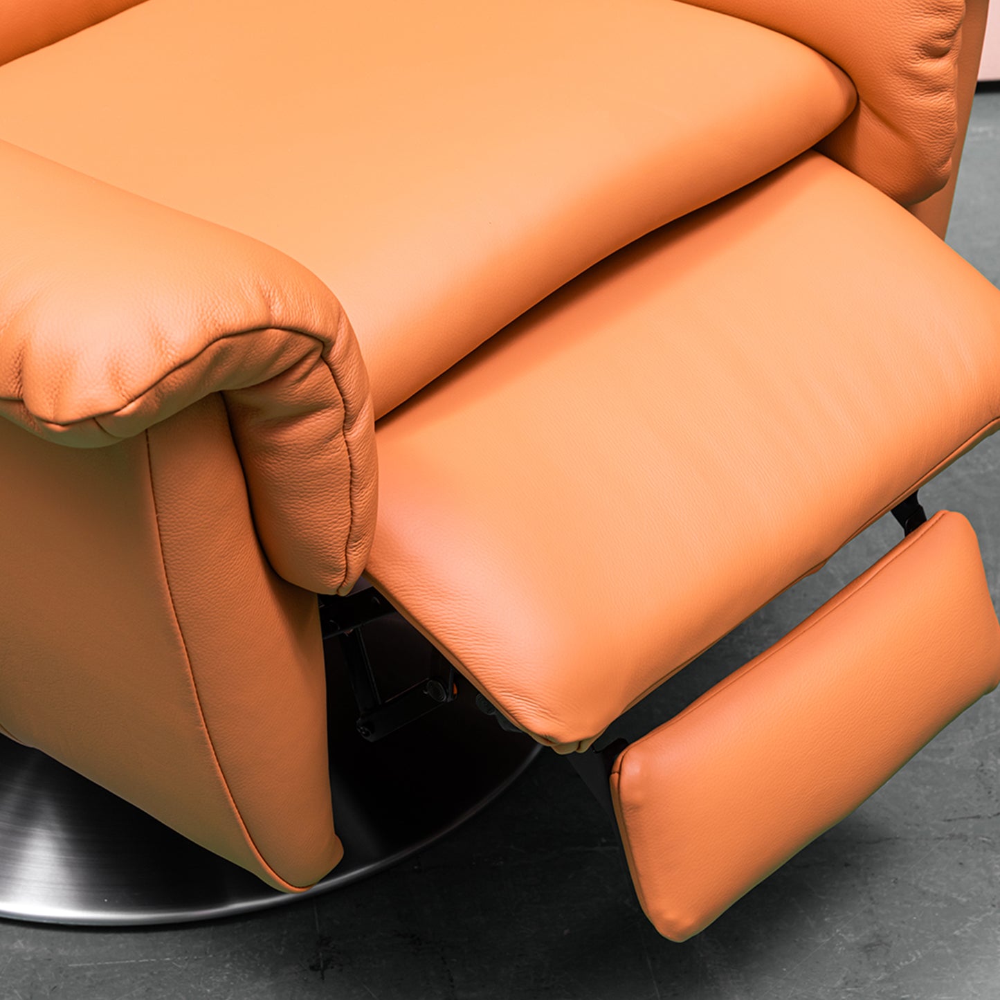 Klaussner Alessandro leather recliner in reclined position with extended footrest demonstrating power functionality