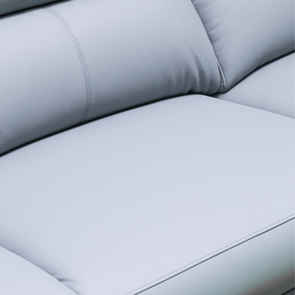 Close-up detail shot showing the premium leather texture and stitching quality for comfort design furniture