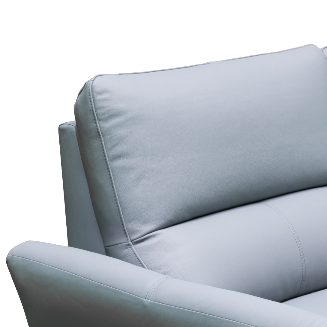Close-up detail shot showing the premium leather texture and stitching quality for comfort design furniture