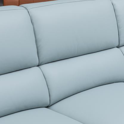 Close-up detail of blue leather upholstery and stitching on Klaussner Milano sectional sofa for comfort design furniture