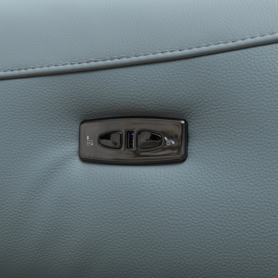 Close up view of the power button in Milano sectional sofa for comfort design furniture