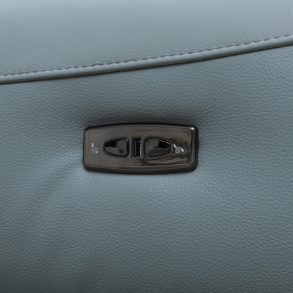 Close up view of the power button in Milano sectional sofa for comfort design furniture