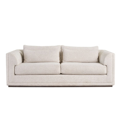 Universal Theo 3-seater sofa close-up showing Sheldon Ivory fabric texture and slot arm detail for comfort design furniture