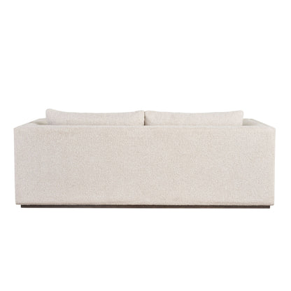 Universal Theo sofa back view showing integrated slot arms and minimalist backrest design for comfort design furniture